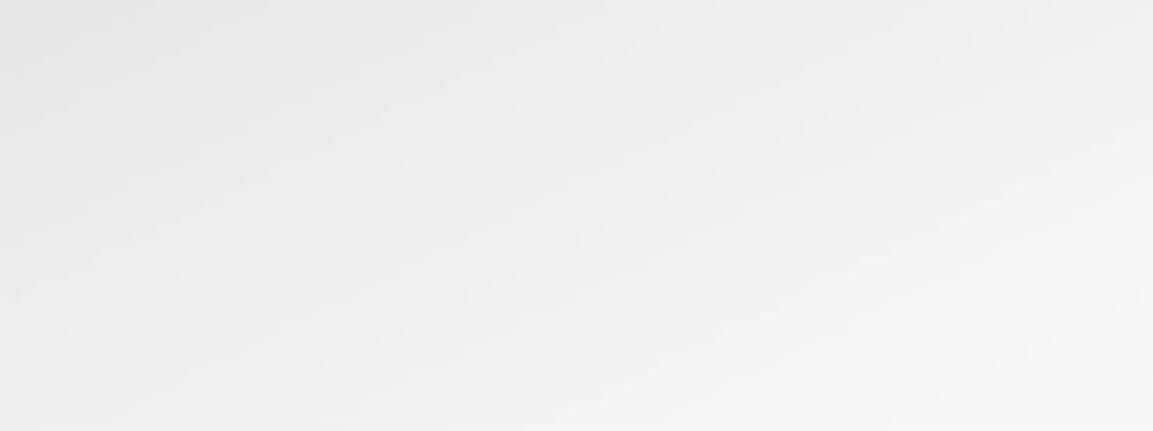 Light gray textured background with subtle variations in tone creating a neutral, minimalist surface.